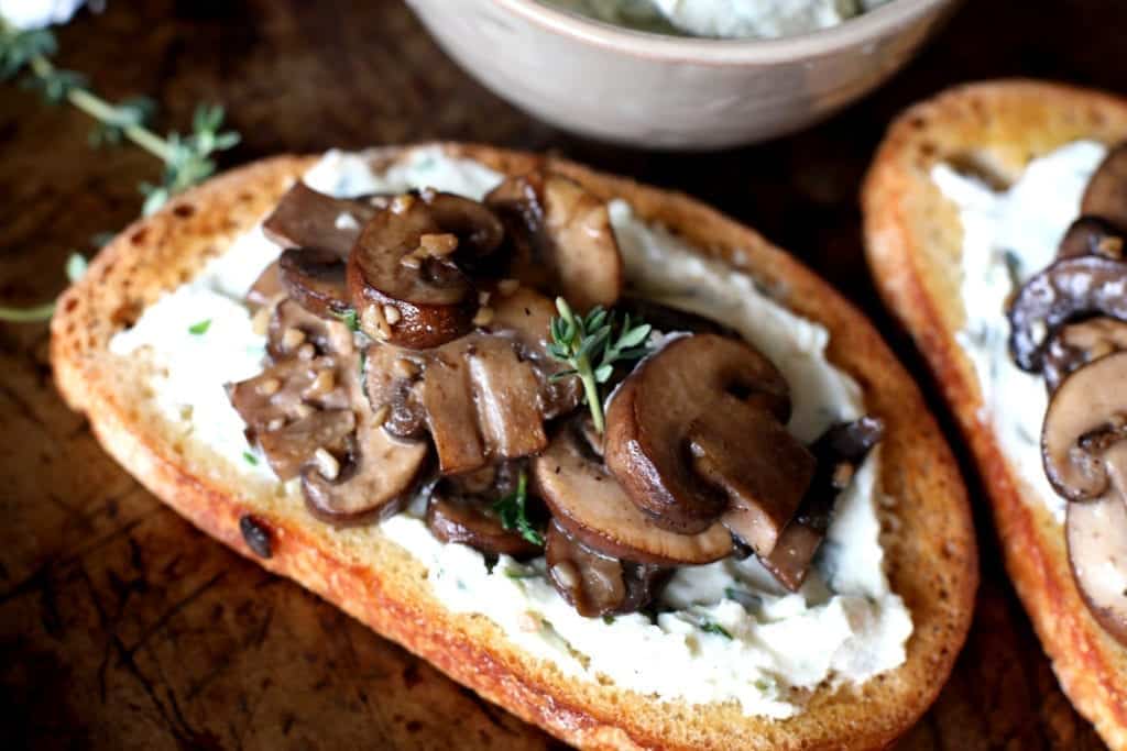 Sautéed mushrooms with garlic butter and herbed ricotta spread