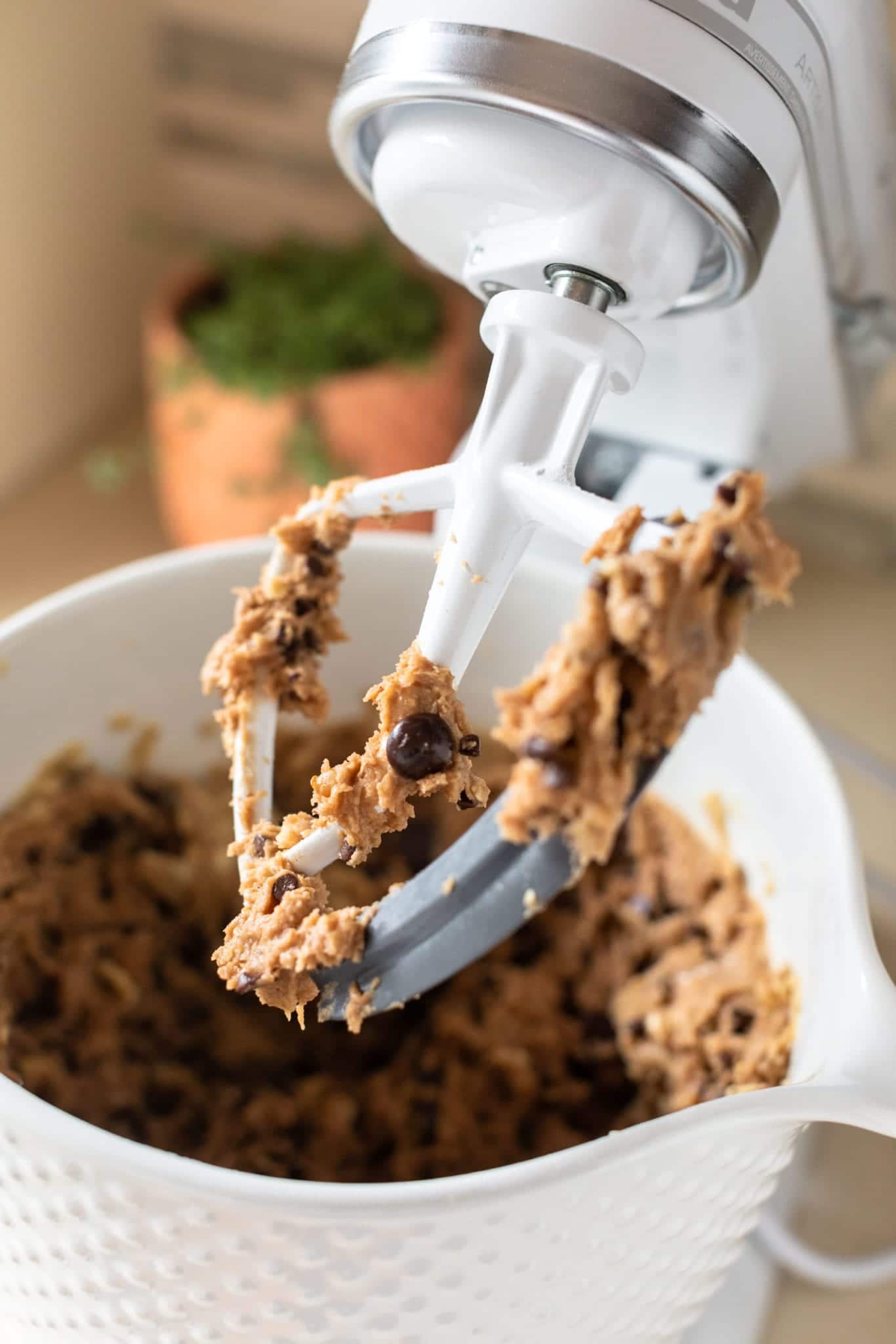 DoubleTree's Signature Chocolate Chip Cookie dough in white stand mixer ready to scoop #cookie #chocolatechipcookie #doubletreesignaturecookie #baking